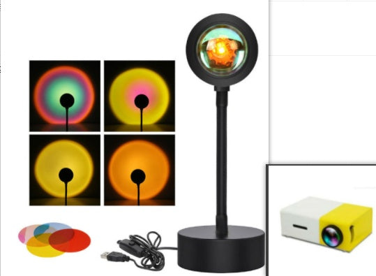 Sunset projection lamp casting warm colors, showcasing remote control and various light effects for cozy ambiance.